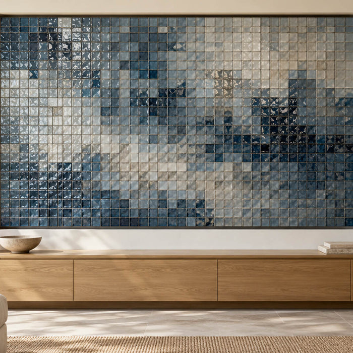 Framed smoky blue glass mosaic accent wall above an oak console in a bright contemporary living room.