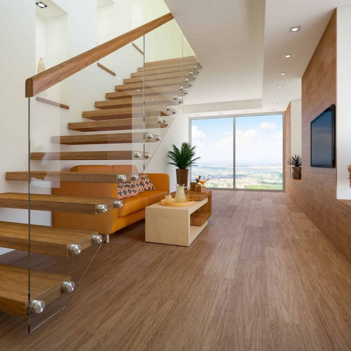 Mixed hardwood floor tones in one house with coordinated light and dark wood finishes