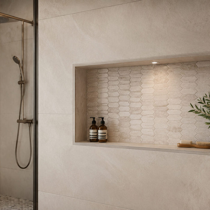 Modern shower niche with neutral tile, mosaic accent, and coordinated bathroom finishes