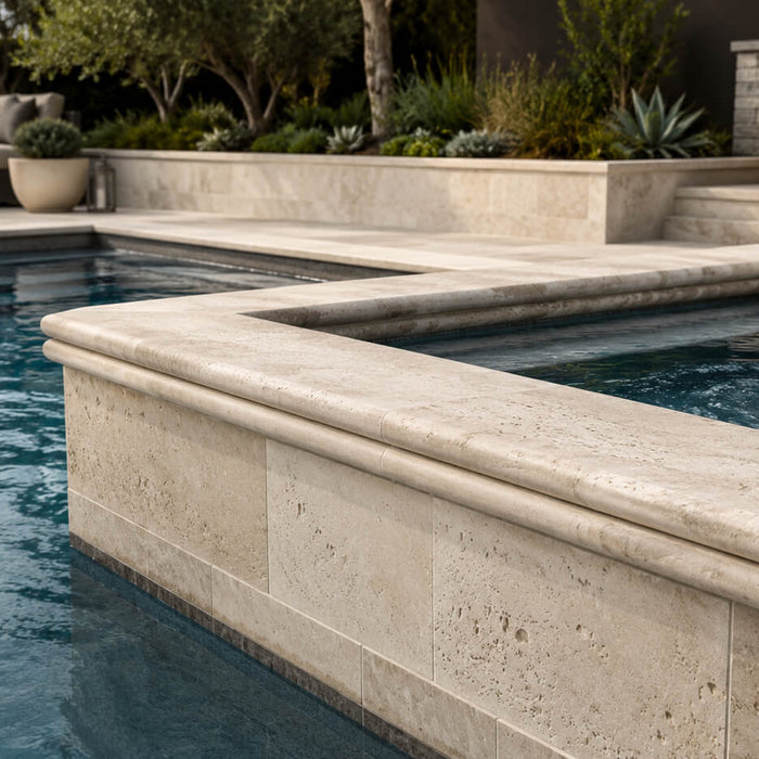 Raised pool and spa with travertine double bullnose coping in a modern outdoor patio