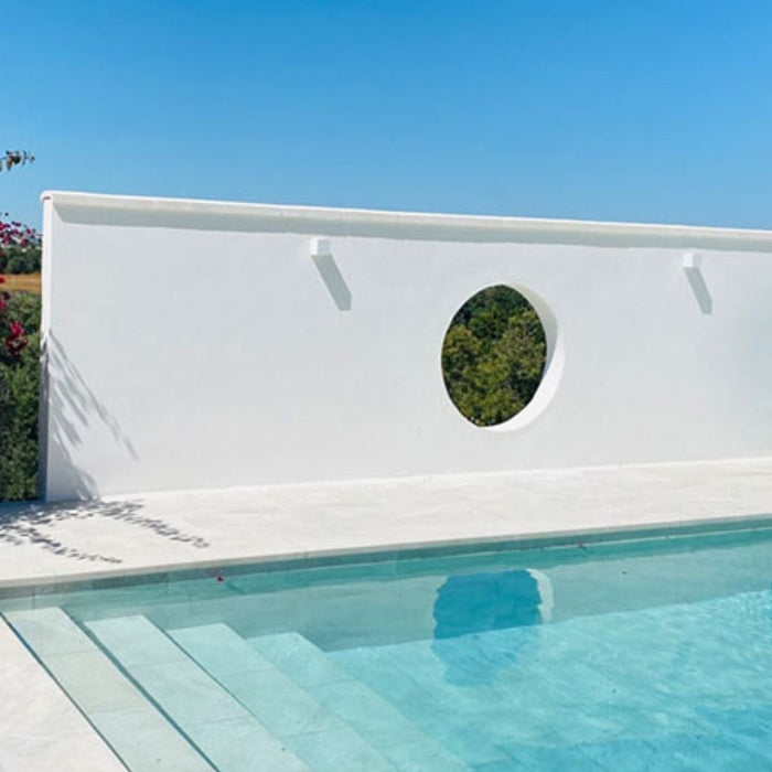 How Does Coping Color Change the Appearance of Pool Water?