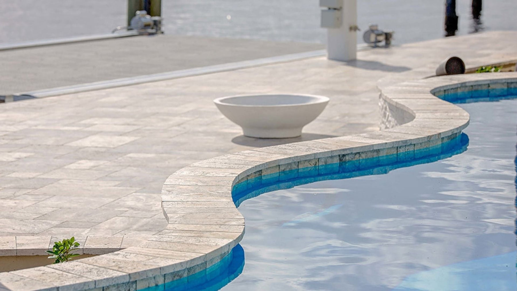 How to Use Natural Stone Coping in Freeform Pool Design