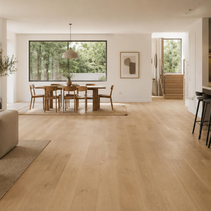 Light oak hardwood flooring in a bright modern open-plan home with warm neutral interiors