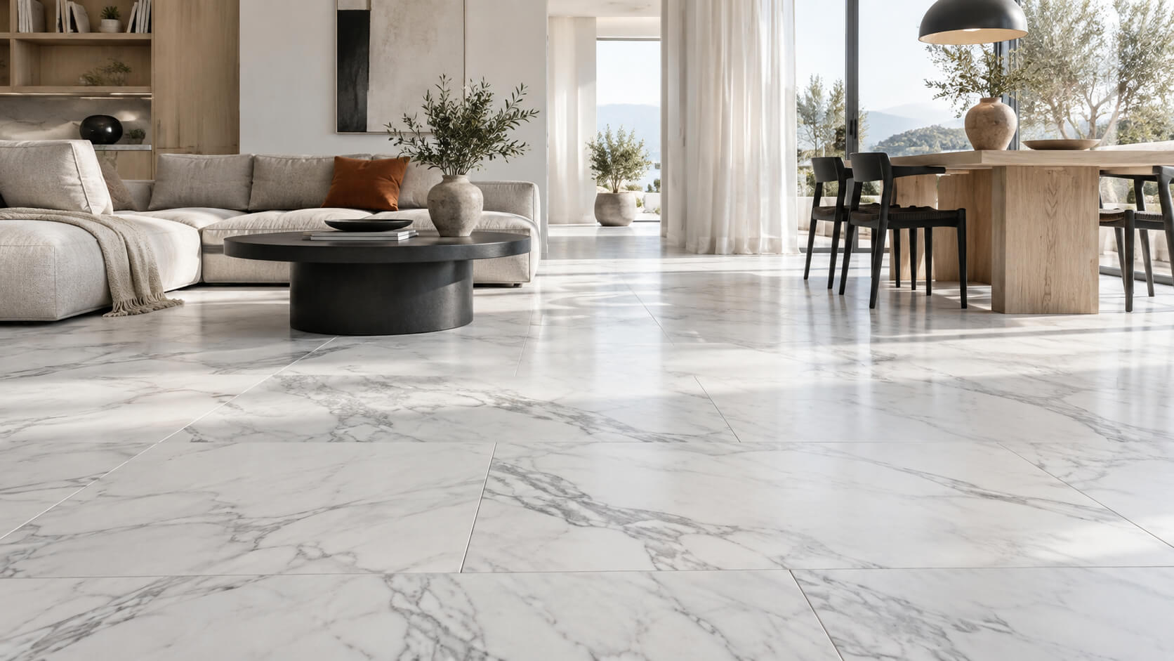 White marble-look vinyl flooring in a bright living and dining room with oak furniture and neutral seating.