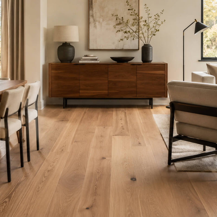 Modern interior showing light oak hardwood flooring coordinated with walnut furniture and neutral upholstery.