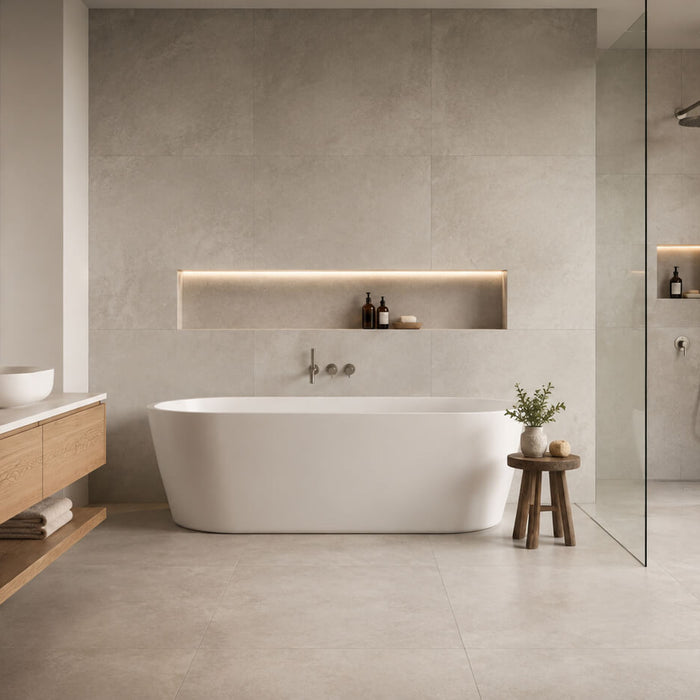 Modern bathroom featuring large-format matte porcelain tile on the walls and floor with warm wood accents.