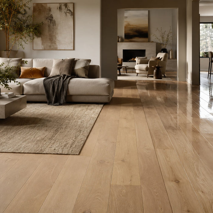 Modern living room with light oak hardwood flooring showing matte and glossy finish reflections