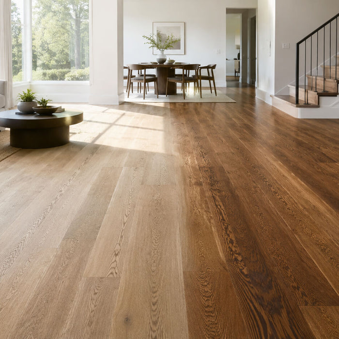 Bright modern living room with a faded-to-restored hardwood floor comparison showing how worn wood can be revived