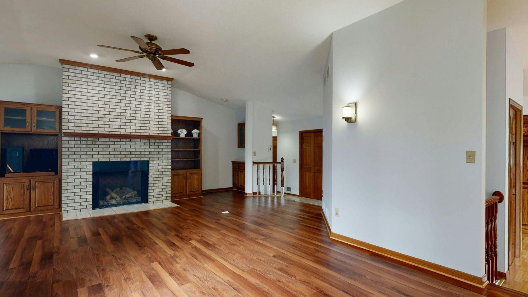 Hardwood flooring compared with laminate vinyl tile and stone materials