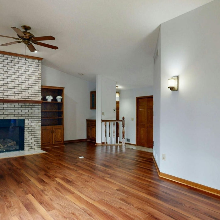 Hardwood flooring compared with laminate vinyl tile and stone materials