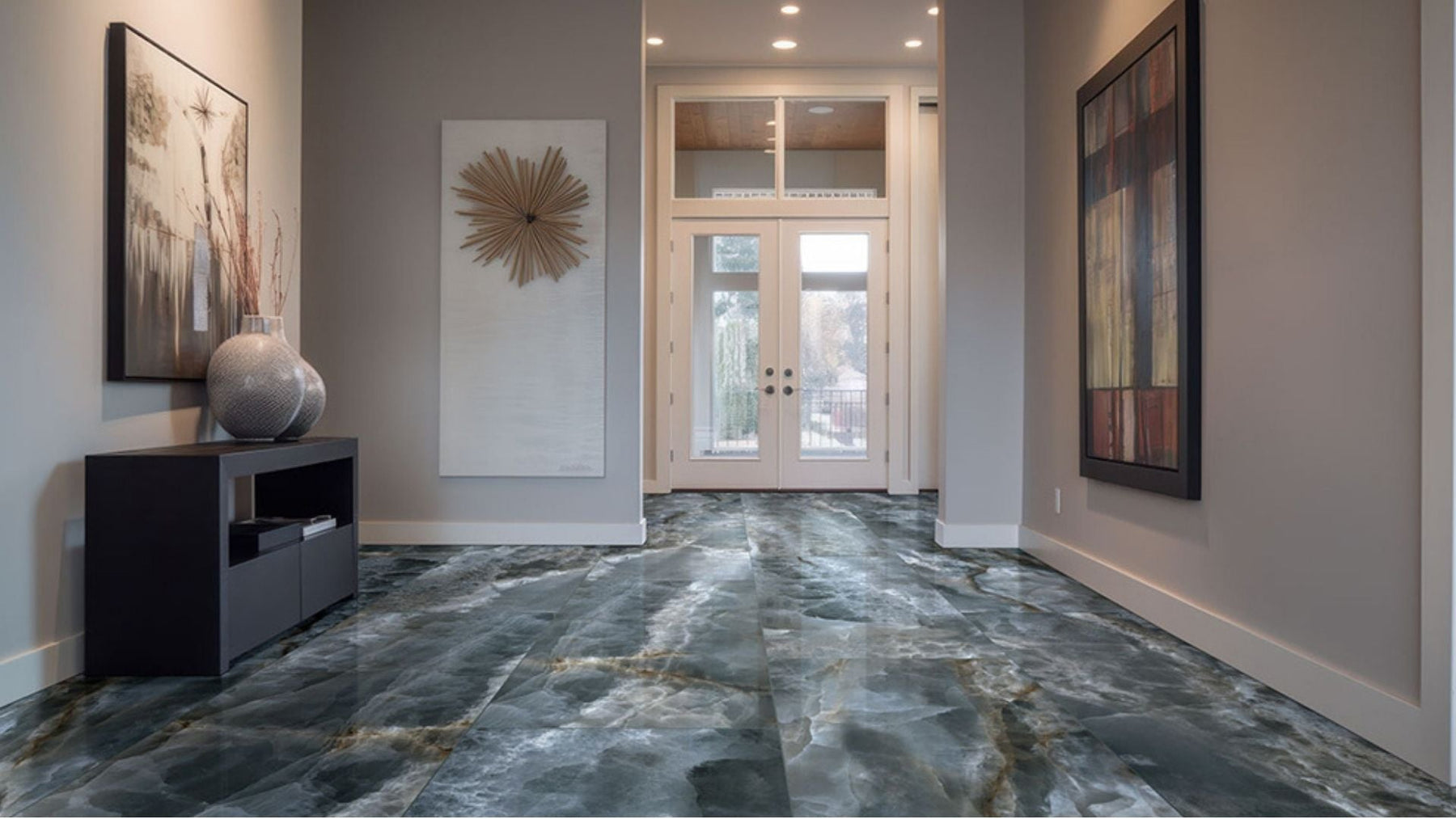 Large format natural stone tile with continuous veining and fewer grout lines