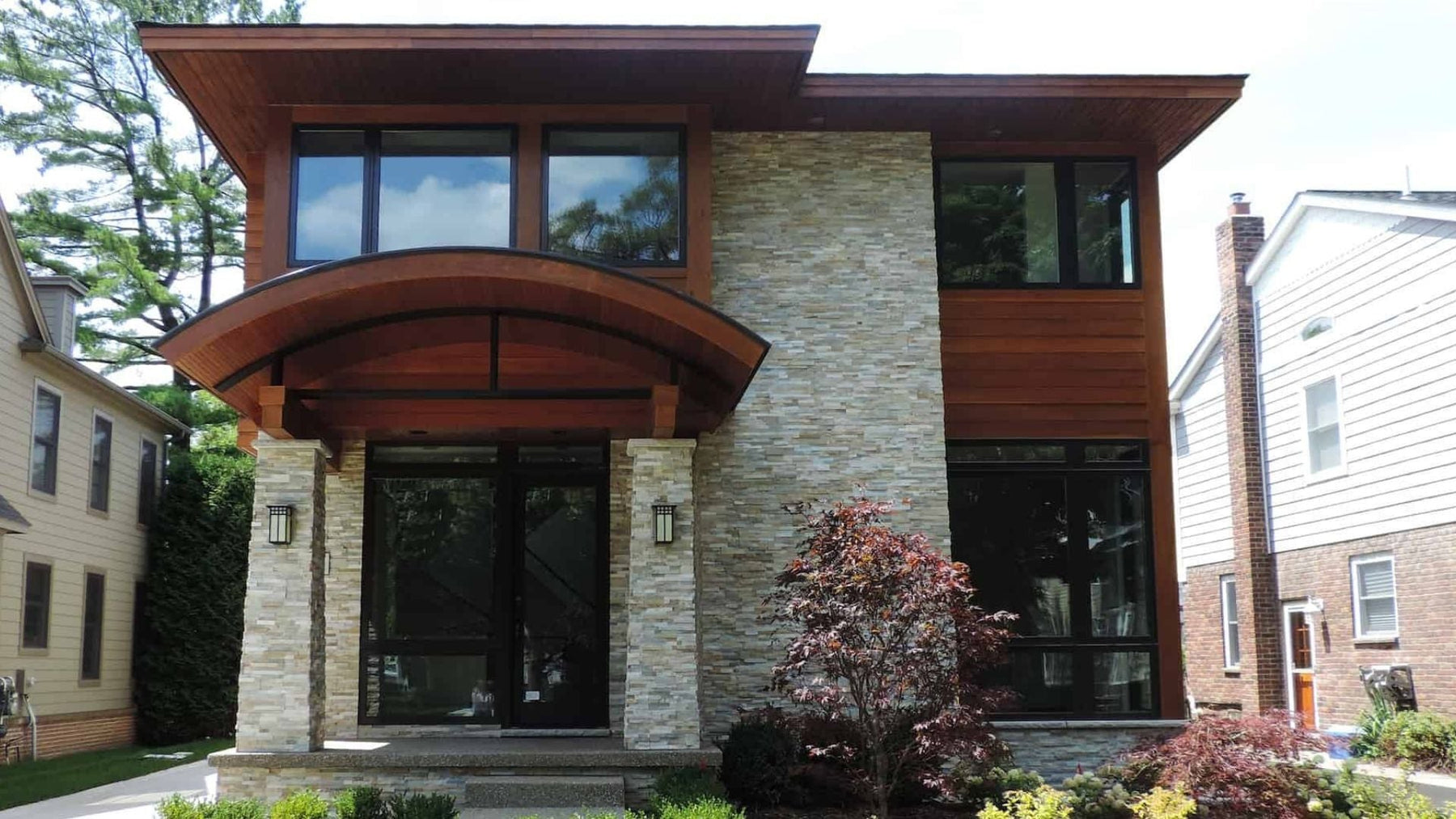 Ledger stone and stone veneer exterior wall comparison