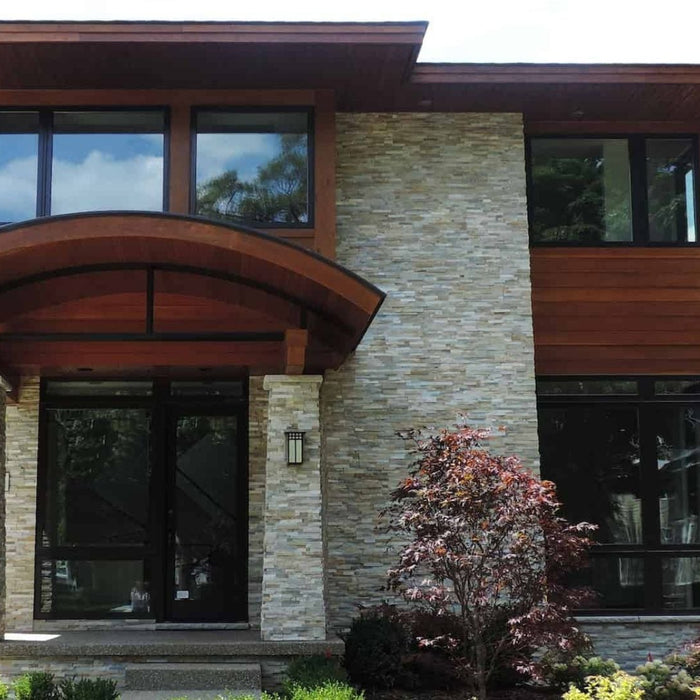 Ledger stone and stone veneer exterior wall comparison