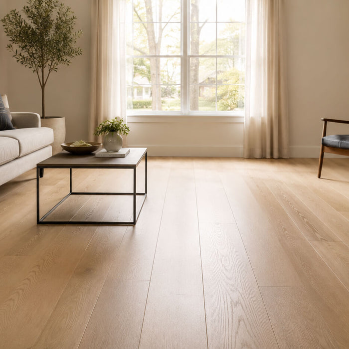 Small living room with light wide plank hardwood flooring creating a bright and spacious appearance