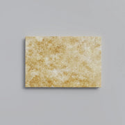 Close-up of Chocolate Brown Walnut Travertine Tumbled 16 x 24 x 1.25 Paver, in Brown tones.