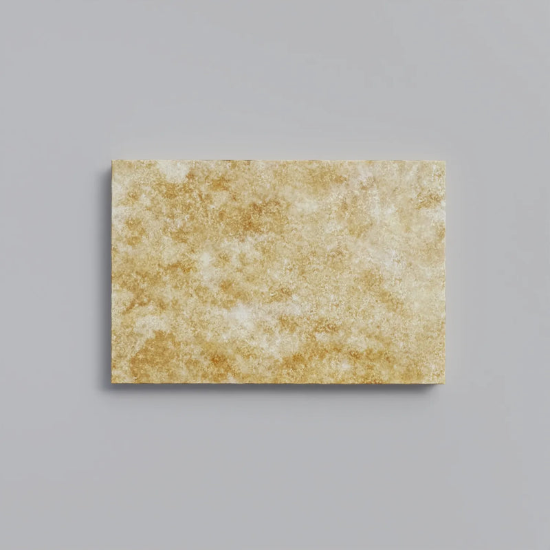 Close-up of Chocolate Brown Walnut Travertine Tumbled 16 x 24 x 1.25 Paver, in Brown tones.