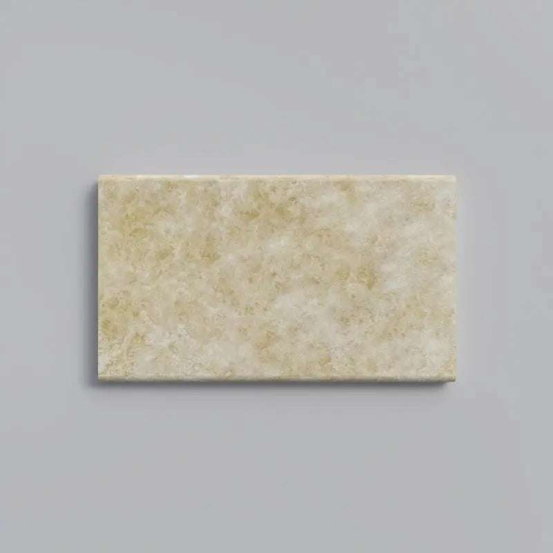 Ivory Cordoba Cream Travertine Tumbled 12 x 24 x 1.25 Double Bullnose Coping