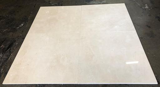 Close-up of Beige Spanishcrema Marfil *Select Marble Polished 24 x 24 x 1/2 Beveled Tile, in Beige tones.