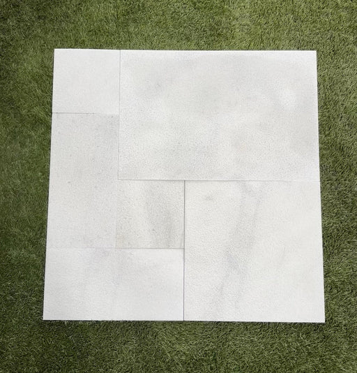 Close-up of White Marble Leather (Sandblasted & Brushed) French Versailles x 1/2 Tile, in White tones.