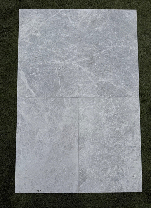 Close-up of Tundra Marble Leather (Sandblasted & Brushed) 16 x 24 x 1/2 Tile, in Tundra tones.