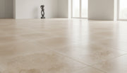 Close-up of Ivory Cordoba Cream Travertine Filled, Honed & Straight Edge 18 x 18 x 1/2 Cross Cut Tile, in Ivory tones.