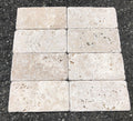 Close-up of Ivory Cordoba Cream Travertine Tumbled 3 x 6 x 3/8 Cross Cut Tile, in Ivory tones.