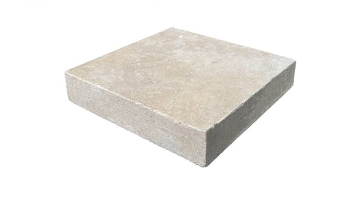 Close-up of Ivory Cordoba Cream Travertine Tumbled 6 x 6 x 3/8 Cross Cut Tile, in Ivory tones.