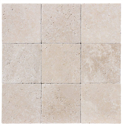 Close-up of Ivory Cordoba Cream Travertine Tumbled 6 x 6 x 3/8 Cross Cut Tile, in Ivory tones.