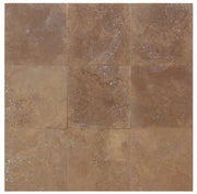 Close-up of Noce Travertine Tumbled 12 x 12 x 3/8 Cross Cut Tile, in Noce tones.