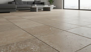Close-up of Noce Travertine Tumbled 18 x 18 x 1/2 Cross Cut Tile, in Noce tones.