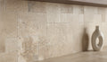 Close-up of Noce Travertine Filled, Honed & Straight Edge French Versailles x 1/2 Cross Cut Tile, in Noce tones.
