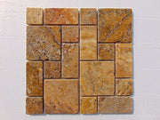 Close-up of Autumn Leaves Scabos Travertine Unfilled, Brushed & Chiseled French Versailles x 1/2 Cross Cut Tile, in Autumn tones.