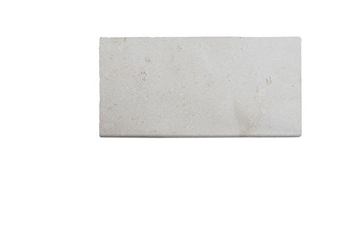 Close-up of Desert Sand Limestone Filled, Honed & Straight Edge 12 x 24 x 1/2 Cross Cut Tile, in Desert Sand tones.