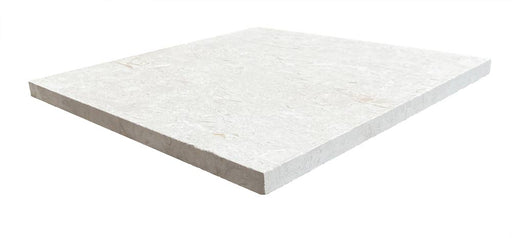 Close-up of Desert Sand Limestone Filled, Honed & Straight Edge 24 x 24 x 1/2 Cross Cut Tile, in Desert Sand tones.