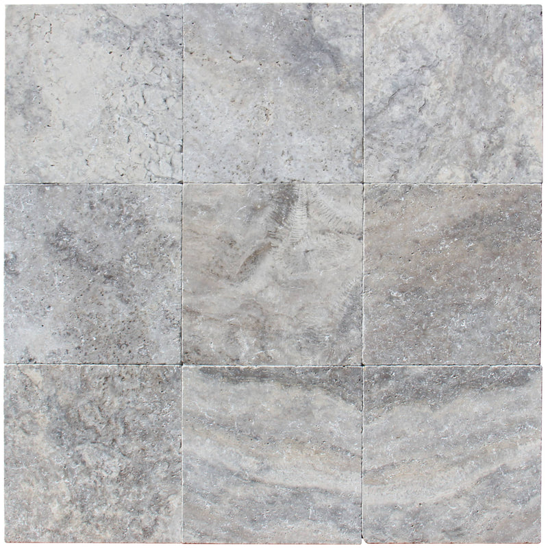 Close-up of Silver Travertine Filled, Honed & Straight Edge 12 x 12 x 3/8 Cross Cut Tile, in Silver tones.