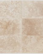 Close-up of Ivory Cordoba Cream Travertine Tumbled 12 x 24 x 1.25 Paver, in Ivory tones.