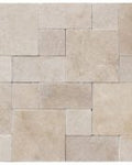 Close-up of Ivory Cordoba Cream Travertine Tumbled Roman x 1.25 Paver, in Ivory tones.