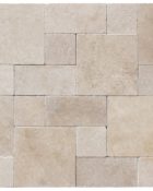 Close-up of Ivory Cordoba Cream Travertine Tumbled Roman x 1.25 Paver, in Ivory tones.