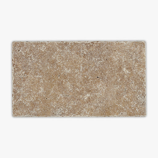 Close-up of Noce Travertine Tumbled 6 x 12 x 1.25 Paver, in Noce tones.