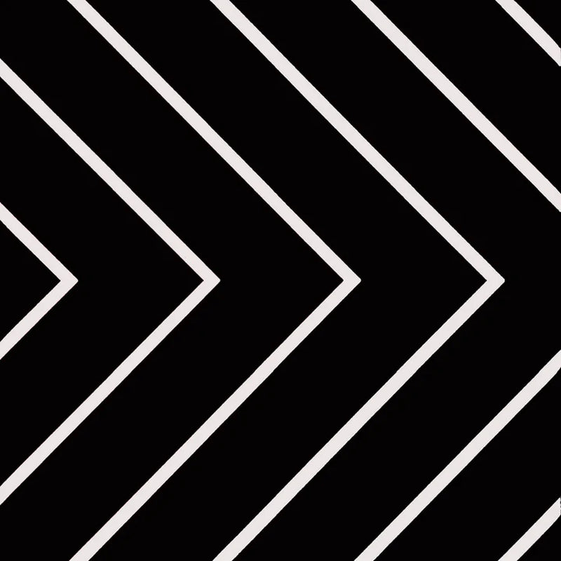 Studio Black 8x8 square matte porcelain tile with a black-and-white diagonal chevron pattern