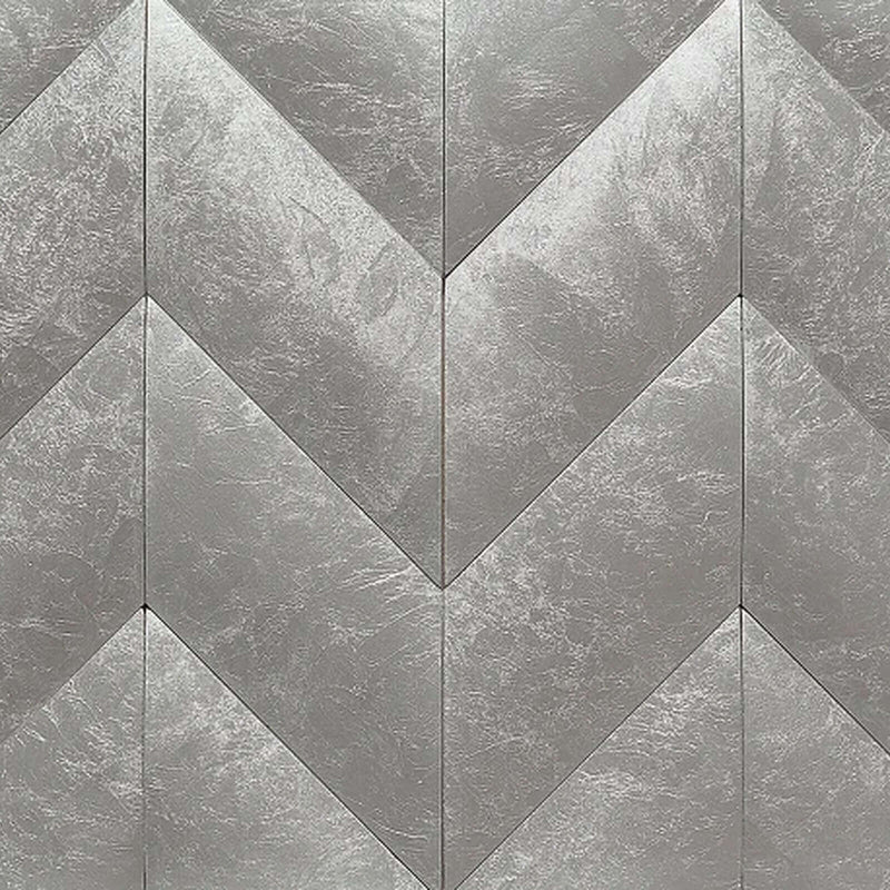 Gray marble chevron mosaic in an interlocking 9-2-5 pattern.