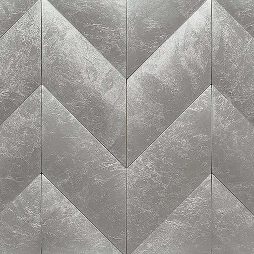 Gray marble chevron mosaic in an interlocking 9-2-5 pattern.