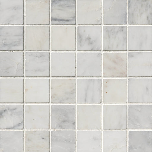 Arabescato Carrara 2x2 honed marble mosaic tile with white and light gray square pieces and natural gray veining.