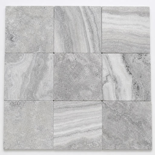 Arctic Silver 12x12 Tumbled Travertine Paver close-up