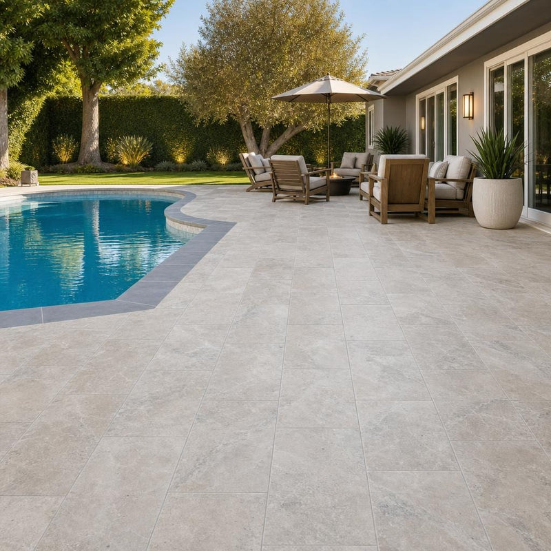 Arctic Silver 12x24 Tumbled Travertine Paver — Backyard pool deck