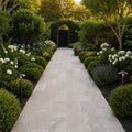 Arctic Silver 12x24 Tumbled Travertine Paver — Garden path