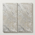 Arctic Silver 12x24 Tumbled Travertine Single Bullnose Pool Coping close-up