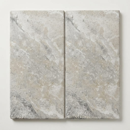 Arctic Silver 12x24 Tumbled Travertine Single Bullnose Pool Coping close-up