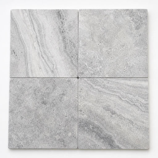 Arctic Silver 16x16 Tumbled Travertine Paver close-up