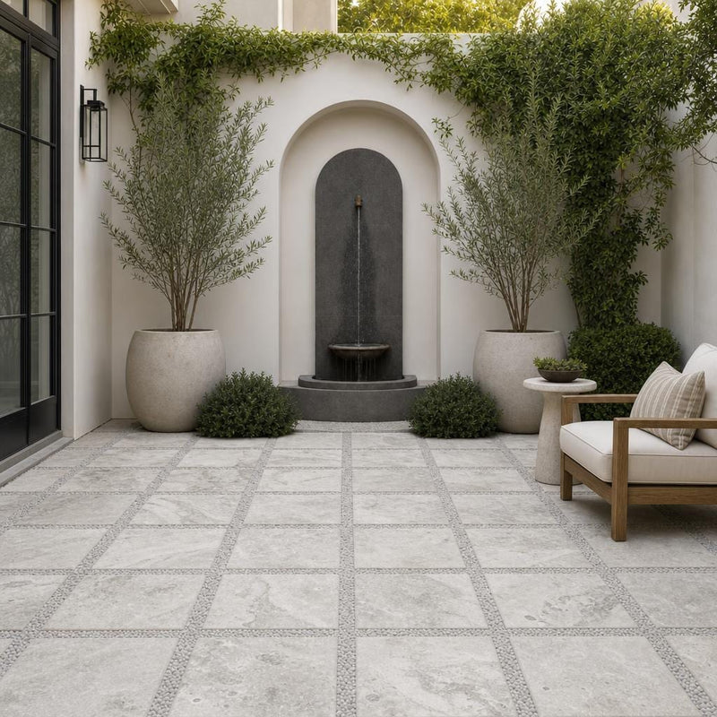 Arctic Silver 16x16 Tumbled Travertine Paver — Courtyard paving